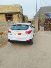 توسان 13 رقم بغداد جديد بسمي مكفولة من الصبغ والتبديل ومحرك وكير عده ب...