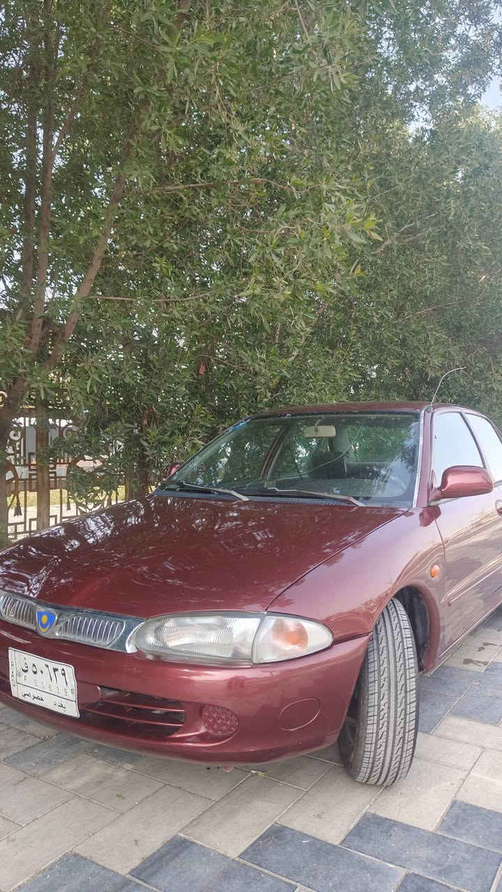 بروتون 2005 سيارة بلادية وماشية قليل رقم بغداد بخ كلير ففط علمود الجراد سعر البيع 70 مكان بغداد *********** بعض الصور مرفقة قبل الكلير
