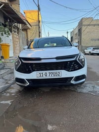 سبورتج ٢٠٢٥ خليجي محرك ٢٠٠٠ دوش للبيع رقم بغداد بيضاء اللون بأسمي ماشي...