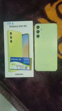 جهاز اي 34 فايف جي للبيع بدون ملحقات بس كارتون سعره 250 وبيه مجال قليل...