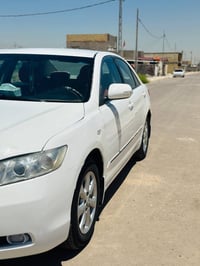 كامري للبيع  GLX خليجي 2007 رقم بغداد جديد سنويه مجدده بإسمي لل 2030 م...