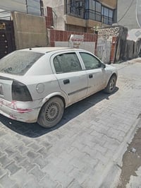 اوبل استرا 2002 رقم بغداد تحويل ثاني يوم كير محرك مكفول تخم تاير يرادل...