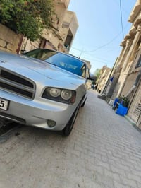جارجر 2010 وارد امريكي الحادث.جاملغ.وشبر.الباب.الباقي.مكفول.صبغ.قطعتين...