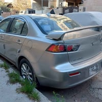 للبيع لانسر قرش موديل 2016 لون شمباني استلام 2023 من الشركه رقم بغداد ...