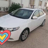 سيراتو 2013 • ١٤٩٠٠٠ كم • كفالة صبغ