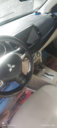 عندي لانسر موديل16 خليجي محرك 1600 بغداد السياره بأسمي بدون ضرر المحرك...
