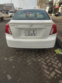 للبيع اوبترا موديل 2012 شركه عامه بيه صبغ باب خلفي مع داير جاملغ سياره...