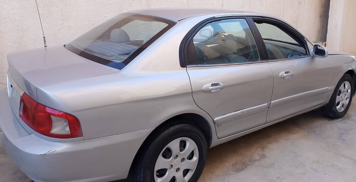 كيا اوبتما 2005 منفيس اوراقها كامله حتئ القرض موجود وكاله عامه 
گير محرك شرط صدر خلفي تعبان بيها طخه باب خلفي جاملغ امامي السعر 33 وبيها مجال مكاني سامراء ***********
