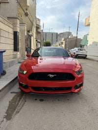 موستنك ECOBOOST16 للبيع اللون احمر مميز  رقم بغداد  حادثها موضح بالصور...