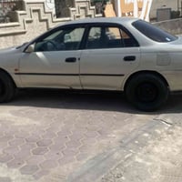 سياره كورلا  السعر 40  وبيه مجال  07708312818