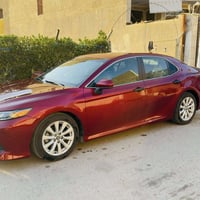 كامري 2020 LE  ماروني كرزي  رقم بغداد باسمي ماشيه ٥٢ الف ميل ٨٨ الف كي...