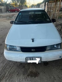 هيونداي أكسيل • أكسيل 1994 • سيارة أوتوماتيك • هيونداي أبيض • سيارة رق...