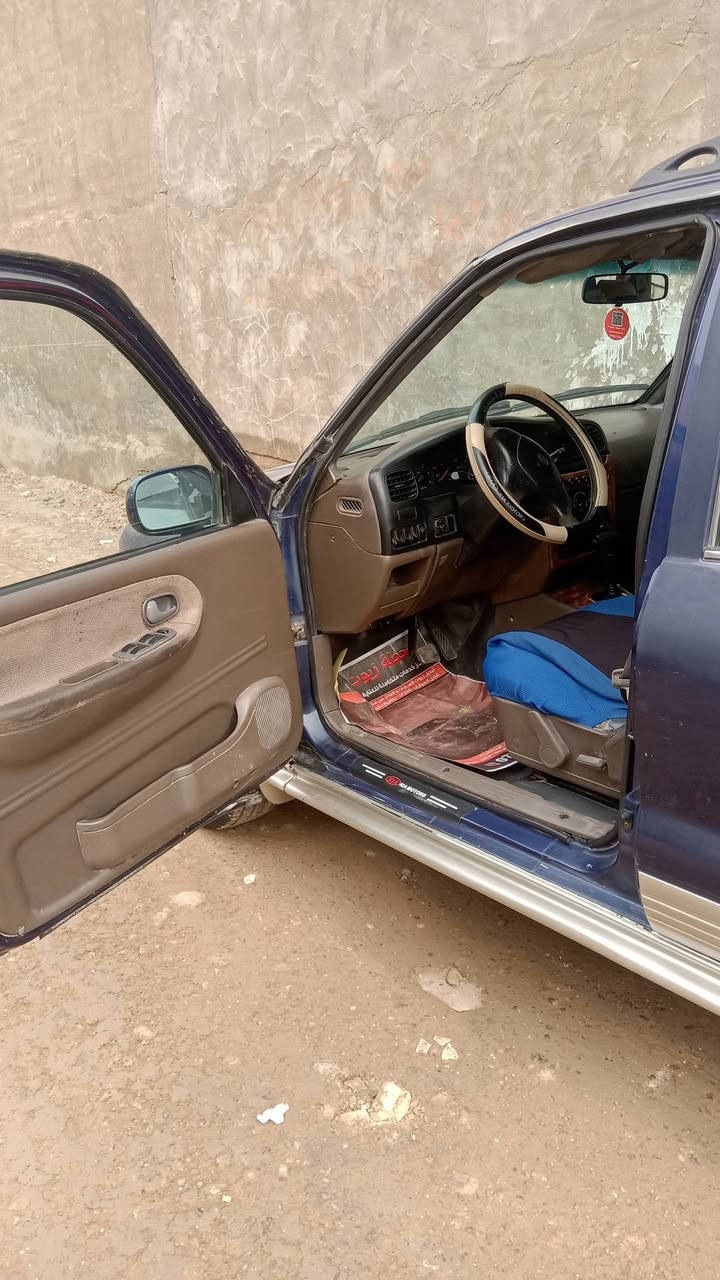 سبورتج ٢٠٠٠ محرك ٢٠٠٠ كير اوتو بلادي بدون صبغ تبريد شغال بأسمي شرط العنوان بغداد التحويل***********السعر ٥٠$ بيها مجال
