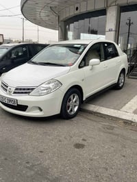 تيدا • ٢٠٠٩ • ابيض لؤلؤي