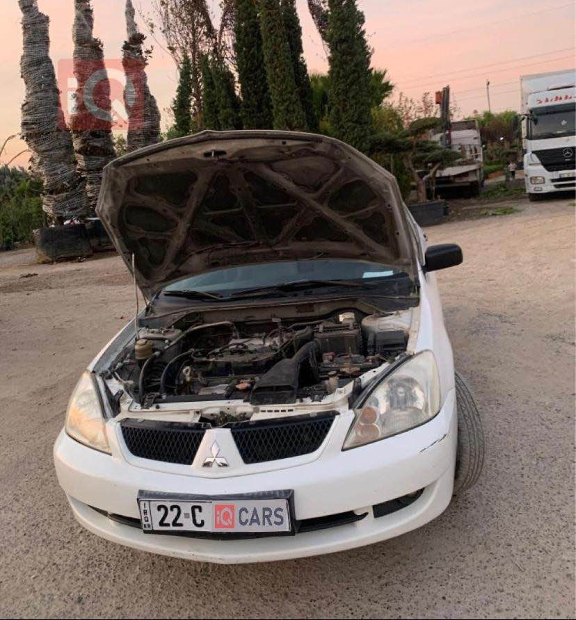 لانسەر ٢٠٠٩ بێ بۆیاغ
مەکینە گچکە 
جام کارەبا 
رەقەم سەنەوی نوێ
بێ بۆیاغ تەنها کەمێک کاڵ بوونەوە و قەپ و قۆپی هەیە لە قەلبی 
سعری ٨٠ وەڕەقە و کەمەک مەجالی برایانە
*********** أربيل, العراق
