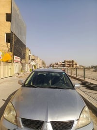 لانسر موديل 2010رقم كربلاء انكيزي الجديد مشروع وطني يعني عادي تتحول بي...