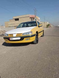 بيجو موديل15السياره مصفره هيئه وغرامات رقم بغداد انكليزي باسمي مكينه و...