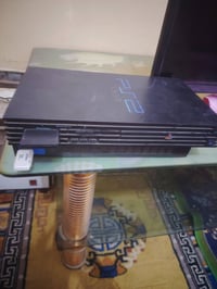 بلايستيشن 2 • ٢ يدات • ٤٠ لعبه