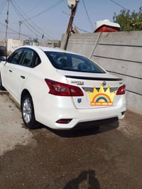 نيسان سنترا صفركيلو متر الاتصال 07715555066