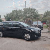 كيا سيدونا رقم بغداد موديل 2017 مقاعد جلد  بصمه  بصمه ابواب  باقي المو...