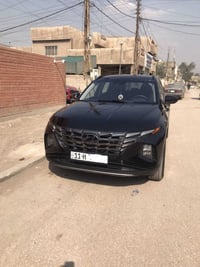 هونداي توسان 2024 هايبرد و بنزين رقم بغداد ب اسمي لون اسود فول عدا الف...