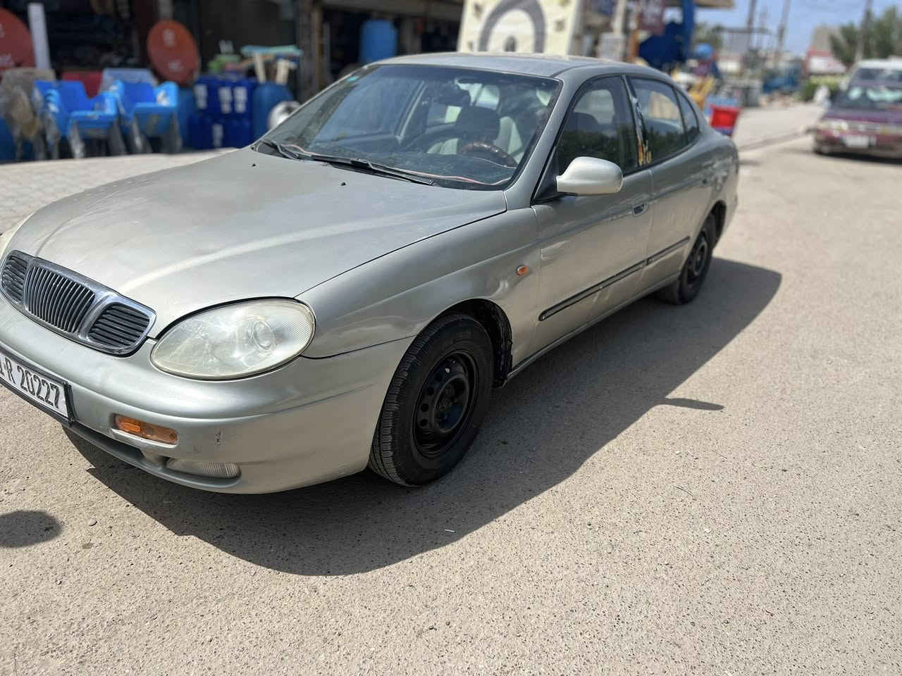 سلام عليكم.. دايو لكنزا رقم بغداد انكليزي جديد هزه جديده محرك خير من الله مفتوح المرغوب كير اوتماتيك ميكانيكي تخم تاير جديد باتري جديد كهربائيات كلها بلاد وشغاله مابيها نقص ابد سنتر لوك سستم مضخم بلاد الكير بي مشكله بي هاف ابيعه كايم  السعر 38$وبيها مجال مكاني بغداد المحموديه ناحيه الرشيد رقم تلفون ***********///***********
