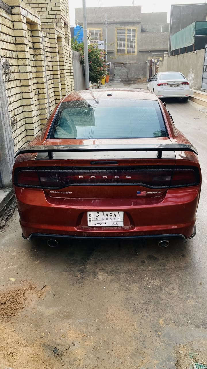 سلام عليكم  شباب
2013
RT. 5.700
عليها برمجه حلوه 

السياره فول. مواصفات للخير. 

وارد امريكي  ::ضررها جاملغ الامامي جهت الصدر  صبغ ::او باب الصدر اكلير من امريكه  والبنيد محدث 
3قطع 

رقم. او سنويه اوهزه جدد 
رقم انكليزي. جديد بغداد 

حداديه اماي وخلفي  جدد صارلهن اقل الشهر 

كير مكينه كفاله 
تخم تاير جديد 

عليه كت كامل SRT

السعر 140 اوبيها مجال كلش بسيط للطيبين 

مكان السياره كربلاء 

الرقم ***********
الرقم ***********
