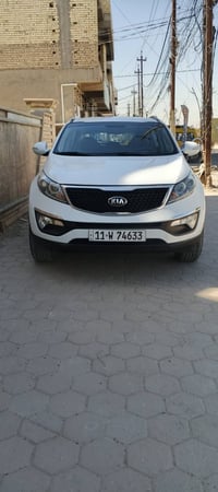 سبورتج 2015 خليجي رقم بغداد دولي  ماشيه 60 ألف  سياره كفاله عامه من ال...