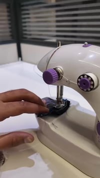 مكينة خياطة • محمولة • SM-202A