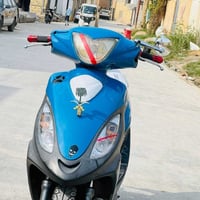 عيوني دراجه كامكو للبيع موديل 14 السعر 750 وبيه مجال قليل 07817504831