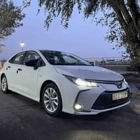 كورلا وارد صيني هايبرد جديده السياره بعدها نظيفه كلش السياره فول مواصف...