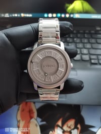 ساعة رجالية • حركة مغناطيسية • تيتانيوم