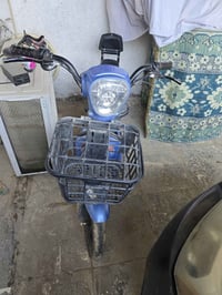 دراجة كهربائية • ٤ بطاريات • بطاريتان ضعيفتان