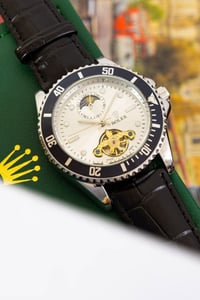 رولكس أوتوماتيك • سنتر شمسي قمري • جلد طبيعي