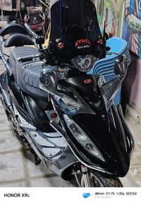 دراجة نارية • نضافة • ديوانية غماس