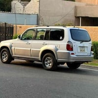 هونداي تريكان 2004 قفلهه 85 ورقه قفل السياره 7 راكب جاهزه السياره للاخ...