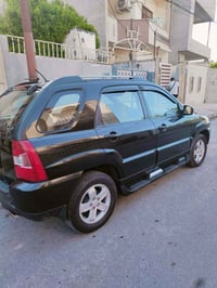 سبورتج 2009 بيها ملاحظات بسيطه بارد  رقم اربيل شرط التحويل  السعر 120و...