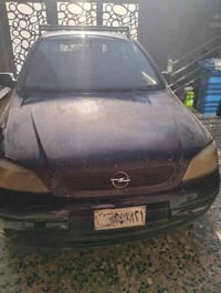 سيارة اوبل استرا صدامي للبيع السعر 2مليون صافي الرقم 07705854508