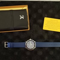 ساعة لويس فيتون • مكينة أصلية • محفظة لويس فيتون