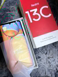 ريدمي 13C • سمائي • بغداد الحرية