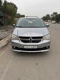 دوج كراند كرفان موديل 2015 رقم بغداد دولي 7 راكب أبواب وجام كهرباء تحك...