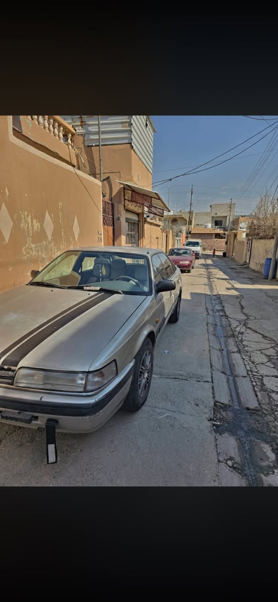 للبيع فقط: مازدا 626 موديل 1988 (طخم فول ونظافة مال بيت)
المحرك: 12 بخاخ (بشرط الفحص).

​الكير: أوتوماتيك (بشرط الفحص).

​التبريد والتدفئة: شغالين 100%.

​

​الداخلية: طخم بطاين أبواب جديد + كشن هيتر (تدفئة) للسائق.

​التحكم: تحكم ستيرن (أغاني) + بصمة تشغيل + تشغيل عن بُعد واطفاء عن بعد 

​التقنيات: شاشة وكاميرا خلفية + كيج قياس ضغط التايرات بالشاشة.

​الخارجية: لايت (عالي/ناصي/سكن) زينون + زوج تايرات جديد.

​الكهربائيات: كاملة وما محتاجة أي شغل.

​نشرة داخلية 12 لون تعمل 

بيها بعض النواقص البسيطة فقط 

​السيارة باسم ولد من الموصل سنوية عظم  لغاية 2027.

​السعر: اتصل على الرقم *********** او راسلني وتدلل
