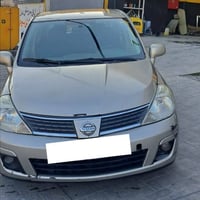 نیسی تیدا 2011 گێر ئۆتۆماتیک  مەکینە 1.8گەورە  شاشە ئایپاد  تەنها سێ پ...