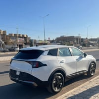 سبورتج EX • ٢٠٢٦ • هايبرد كوري