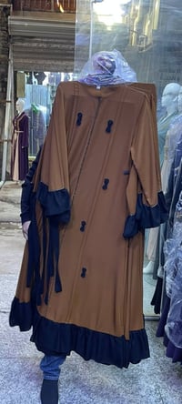 التبه حي الربيع • قرب مدرسة البشارة • ملابس