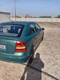 اوبل استره موديل 2002 للبيع   مكاني بغداد ابو غريب  07864496665 075156...