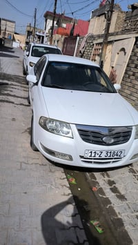 نيسان سامسونك موديل 2007 سيارة اخت الجديدة كفالة عامه من كلشي  رقم بغد...