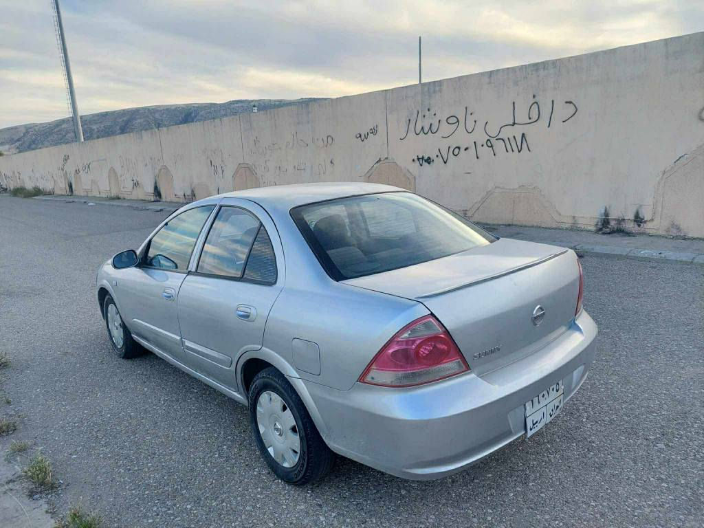 نیسان سەنی کوری مودیل 2010  سەنەوی دومانگەبەسەرجوە بەشەرتی تەحویلو غرامە بەشەرت  سەقفو شانی بۆیاخی نیە پیشی دەعمی هەیە دوای کەپسە گیرو مەکینەو تەقەوڕەقەو تەبریدی بەشەرت دیناری مسرەفی تیانیە سعری59 گڵا قوفڵی ژم ***********      ***********  شوین دەربەنیخان دار بنديهكان, السليمانية
