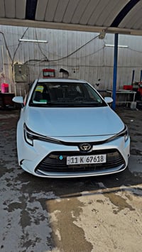 كورلا هايبرد موديل 2025 ماشيه 24الف السعر ١٥٠ بيها مجال قليل  مكاني بغ...