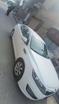 اوبتيما ٢٠١٣ • ابيض • رقم قادسيه